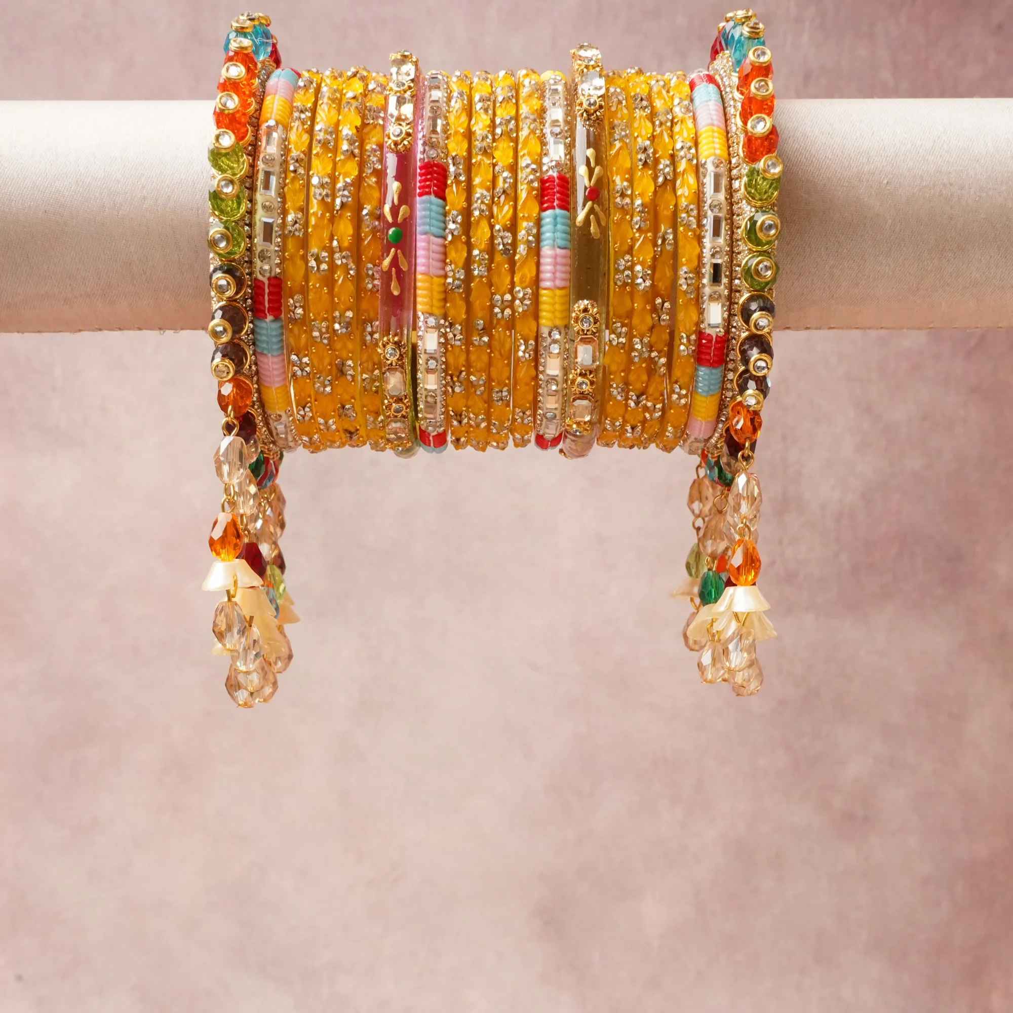 A commanding Golden Yellow anchors this beautiful set, enriched with accents of Crystal Clear, White, Ruby Red, Emerald Green, Sky Blue, Rose Pink, Tangerine Orange, Amethyst Purple, Bronze that add depth and dimension.

Featuring a striking composition of Gold-toned Metal Alloy, Rhinestone Crystals, Glass Beads, Faux Pearls, Lacquer Enamel, this set carries intricate craftsmanship and strong presence. Grand in form, it is created for moments that deserve to be marked.